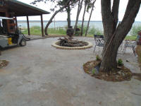 there is also a large concrete patiowith fire pit for Caney Point peoples to enjoy